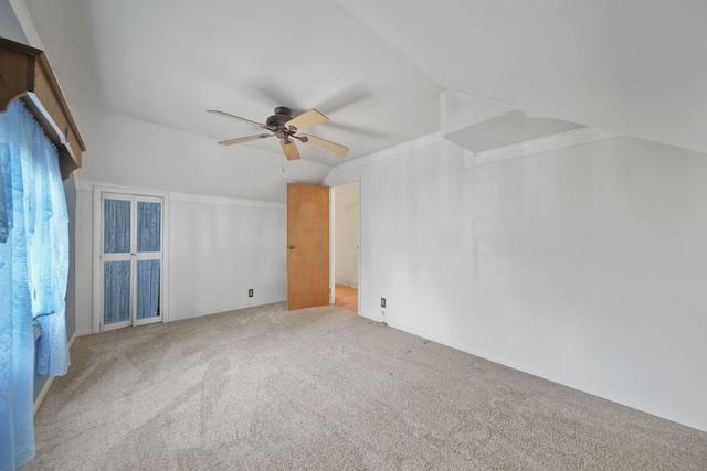 8577 Glenwood Ct, Jackson, MI 49201 - carpeted empty room with a ceiling fan and vaulted ceiling