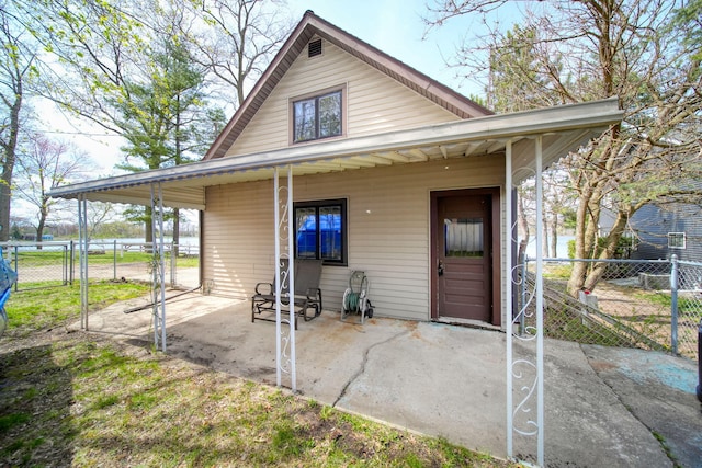 8577 Glenwood Ct, Jackson, MI 49201 - exterior space featuring fence, a gate, and a patio area