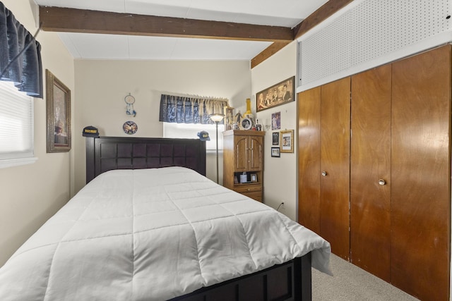 1560 S Carlson St, Westland, MI 48186 - bedroom with a closet, carpet flooring, and beamed ceiling