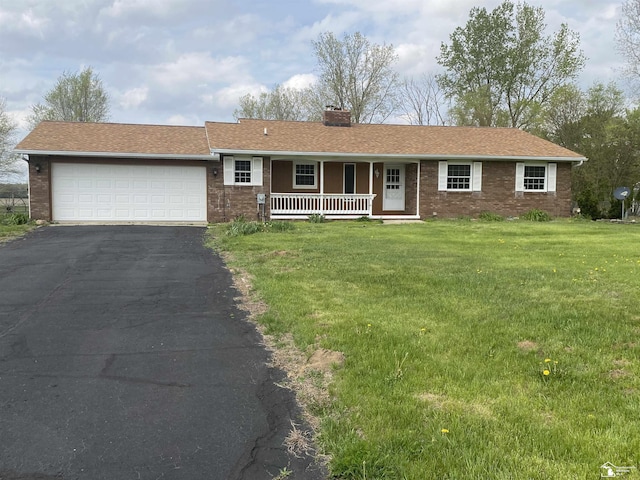 12036 S Custer, Dundee, MI 48133 - ranch-style house featuring a porch, a chimney, asphalt driveway, and brick siding