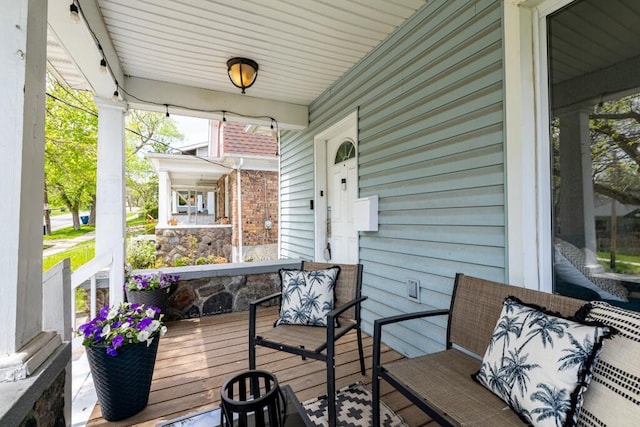 deck with covered porch