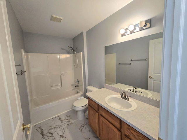 full bathroom with washtub / shower combination, vanity, toilet, marble finish floor, and visible vents