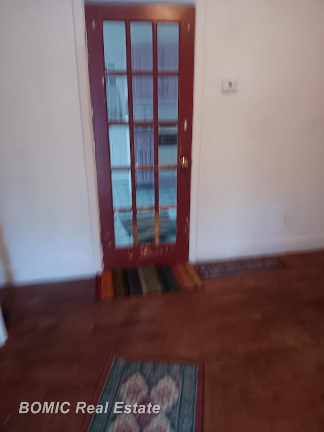 unfurnished room featuring wood finished floors