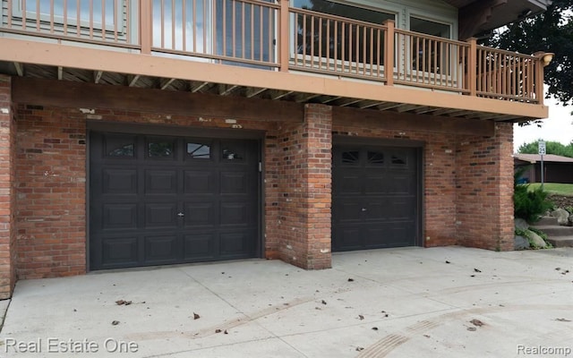 garage featuring driveway