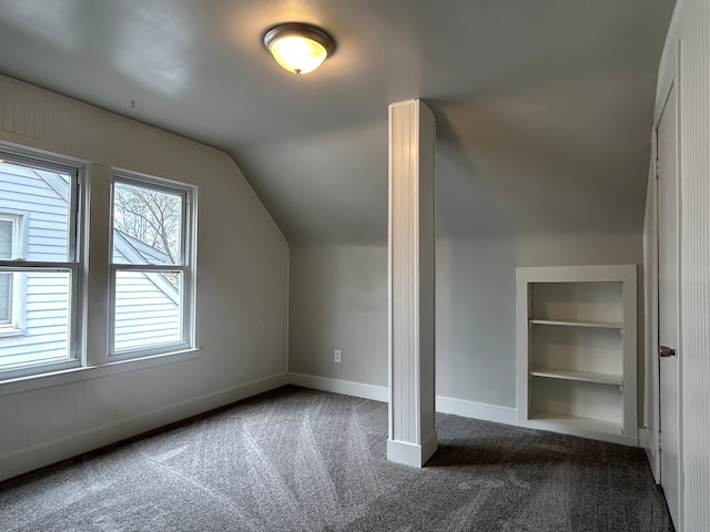 2528 Corbin St, Melvindale, MI 48122 - additional living space with baseboards, carpet, and vaulted ceiling