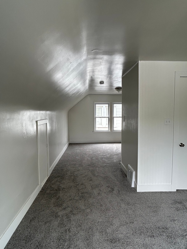 2528 Corbin St, Melvindale, MI 48122 - bonus room with carpet floors, visible vents, baseboards, and lofted ceiling