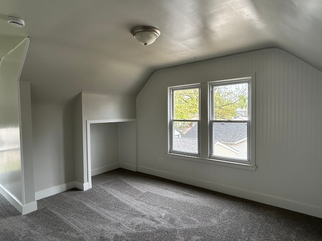 2528 Corbin St, Melvindale, MI 48122 - bonus room featuring carpet flooring, baseboards, and lofted ceiling