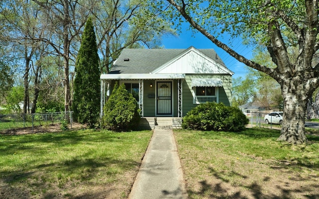 view of front of home featuring a shingled roof and a porch