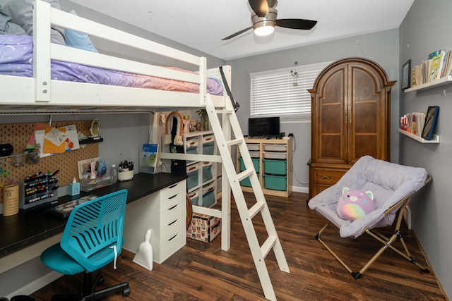 bedroom featuring ceiling fan and dark wood-style floors