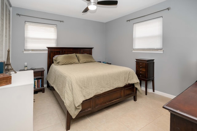 bedroom featuring ceiling fan and light tile patterned floors