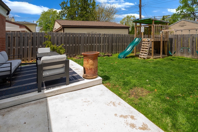 view of yard with a playground and a fenced backyard