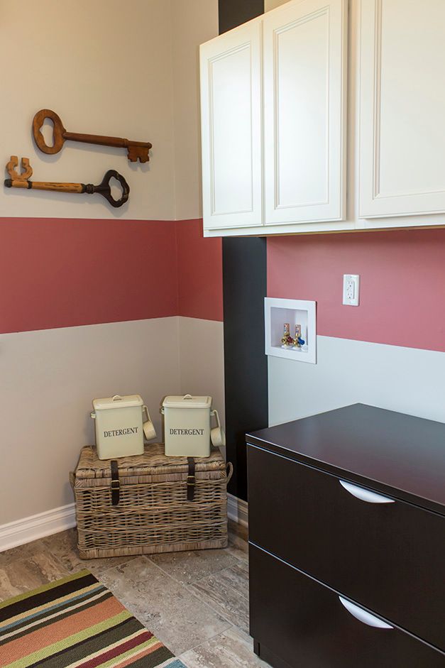 clothes washing area with baseboards, cabinet space, and hookup for a washing machine