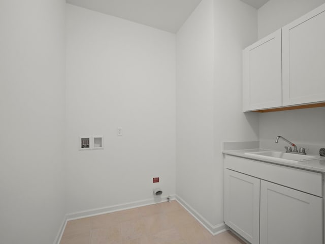 clothes washing area with cabinet space, washer hookup, a sink, baseboards, and electric dryer hookup
