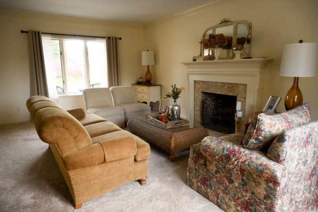 carpeted living area featuring a fireplace and crown molding