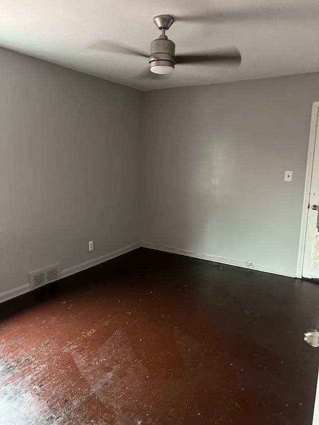 15758 Hubbell St, Detroit, MI 48227 - unfurnished room featuring concrete floors, ceiling fan, and baseboards