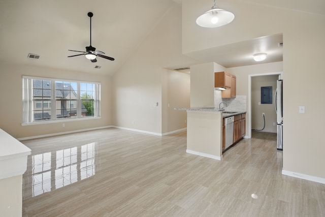 unfurnished living room featuring a sink, high vaulted ceiling, light wood-type flooring, a ceiling fan, and baseboards