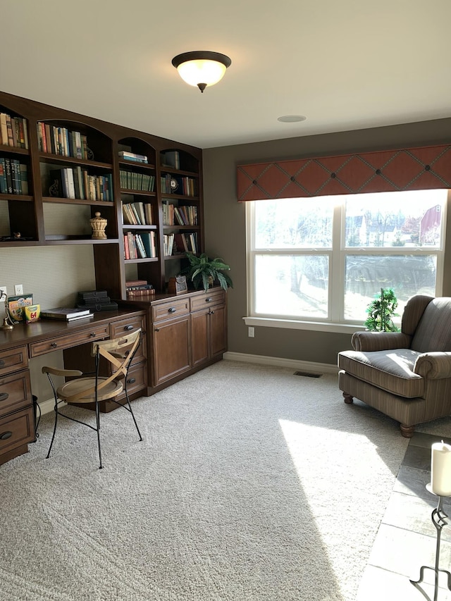 office space featuring light colored carpet and visible vents