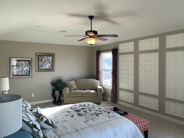 bedroom with carpet floors, baseboards, vaulted ceiling, and ceiling fan