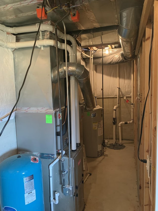 utility room with water heater