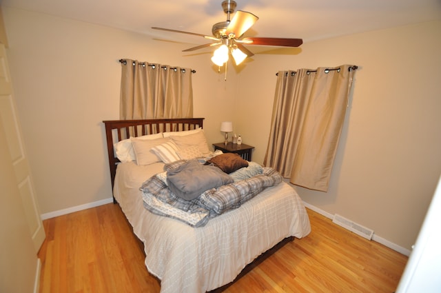 1506 E Windemere Ave, Royal Oak, MI 48073 - bedroom featuring a ceiling fan, baseboards, visible vents, and light wood-style floors