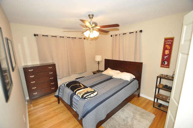 1506 E Windemere Ave, Royal Oak, MI 48073 - bedroom featuring a ceiling fan, baseboards, and light wood-style flooring
