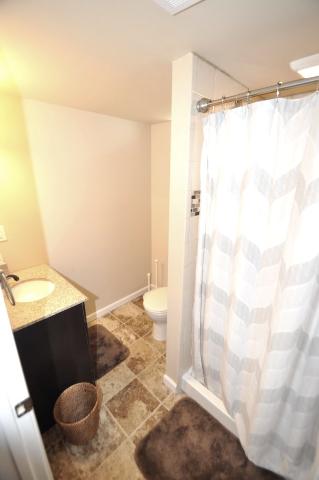 1506 E Windemere Ave, Royal Oak, MI 48073 - bathroom with vanity, baseboards, toilet, and curtained shower