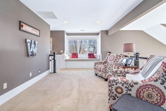 living area with visible vents, baseboards, an upstairs landing, carpet flooring, and recessed lighting