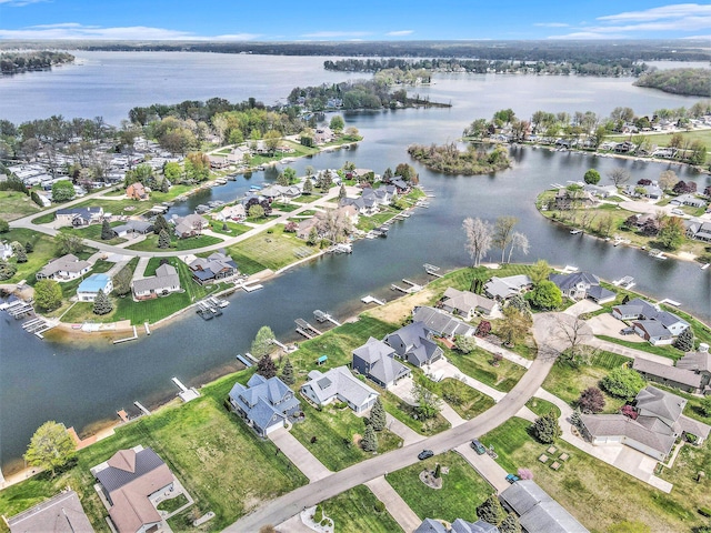 aerial view with a water view and a residential view