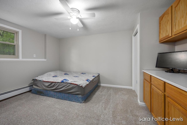 bedroom featuring a ceiling fan, a baseboard radiator, light colored carpet, and baseboards