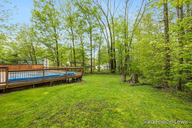 view of yard with a deck