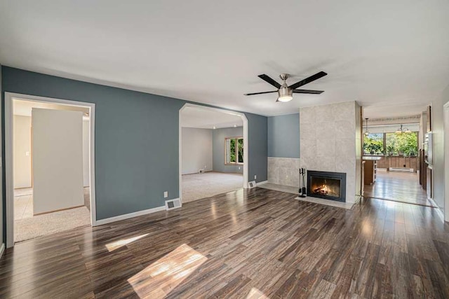 410 Orchard Ct, Saint Louis, MI 48880 - unfurnished living room featuring a wealth of natural light, ceiling fan, visible vents, and wood finished floors