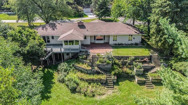 410 Orchard Ct, Saint Louis, MI 48880 - rear view of property with a yard and stairway