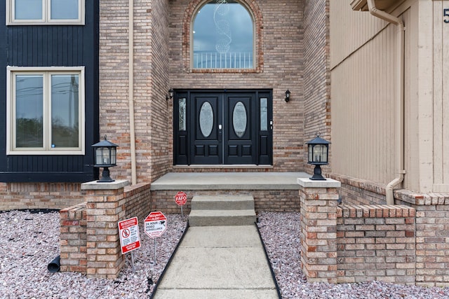 5615 Woodmire Dr, Macomb, MI 48316 - property entrance with brick siding