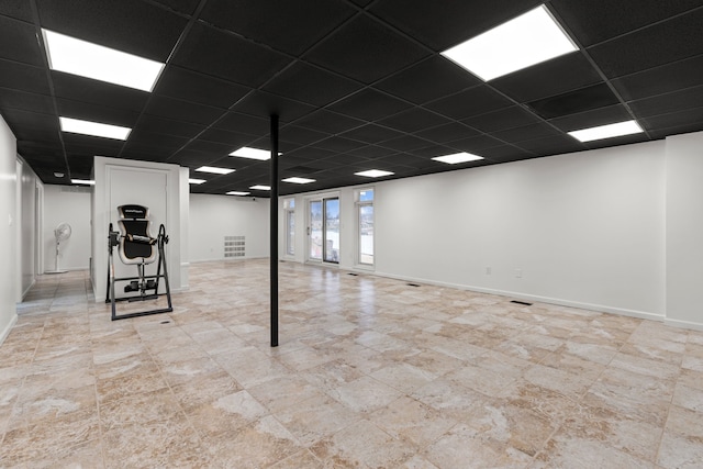5615 Woodmire Dr, Macomb, MI 48316 - basement with baseboards and a drop ceiling