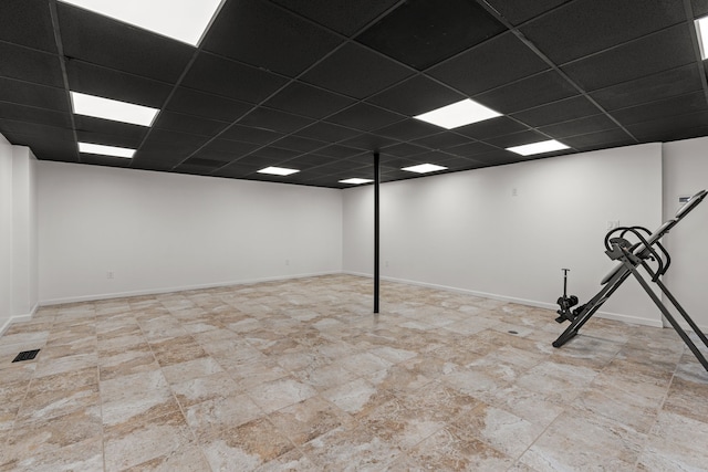 5615 Woodmire Dr, Macomb, MI 48316 - finished basement with visible vents, a paneled ceiling, and baseboards