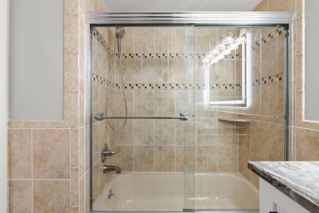 5615 Woodmire Dr, Macomb, MI 48316 - bathroom featuring vanity and bath / shower combo with glass door
