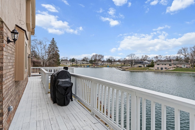 5615 Woodmire Dr, Macomb, MI 48316 - exterior space featuring a deck with water view and a residential view