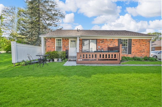 2917 Whittier Ct, Ann Arbor, MI 48104 - back of house featuring a lawn and brick siding