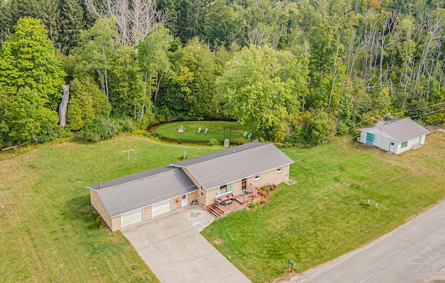 aerial view featuring a forest view
