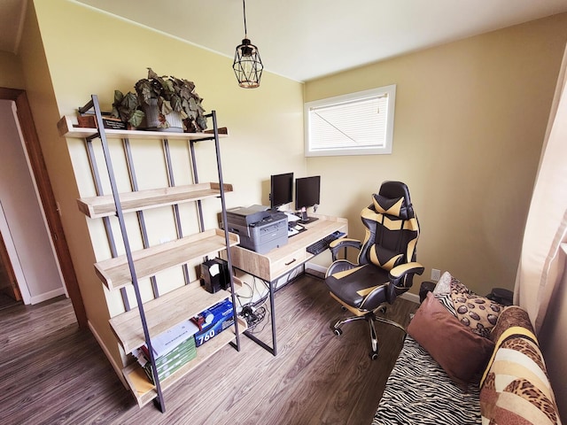 office featuring baseboards and wood finished floors