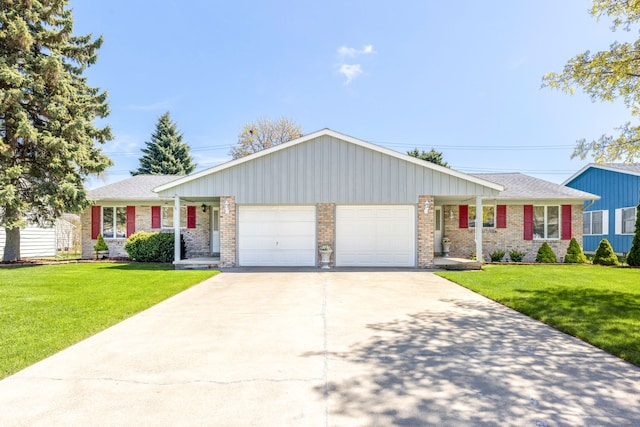 ranch-style house featuring an attached garage, a front lawn, driveway, and brick siding