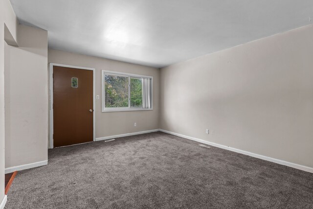 289 Nebraska Ave, Pontiac, MI 48341 - carpeted spare room featuring baseboards and visible vents