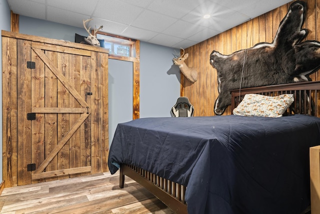 2469 Ash Te Wette Beach Dr, Hillsdale, MI 49242 - bedroom with a drop ceiling and wood finished floors