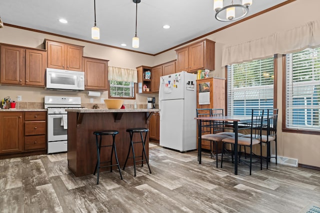 2469 Ash Te Wette Beach Dr, Hillsdale, MI 49242 - kitchen featuring white appliances, crown molding, light wood-style flooring, and open shelves