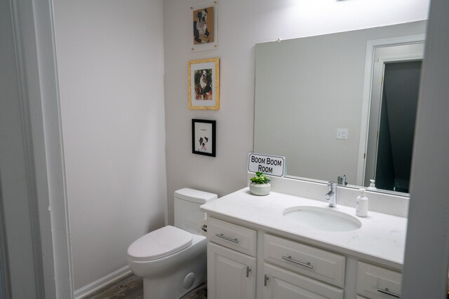 6175 Foxfire Cir, Clarkston, MI 48346 - half bath featuring toilet, vanity, and wood finished floors