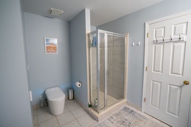 6175 Foxfire Cir, Clarkston, MI 48346 - full bathroom with tile patterned flooring, a shower stall, and toilet
