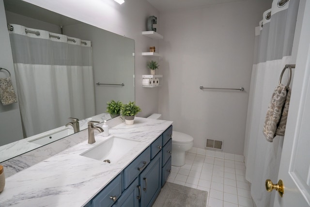 6175 Foxfire Cir, Clarkston, MI 48346 - bathroom with tile patterned flooring, vanity, and toilet