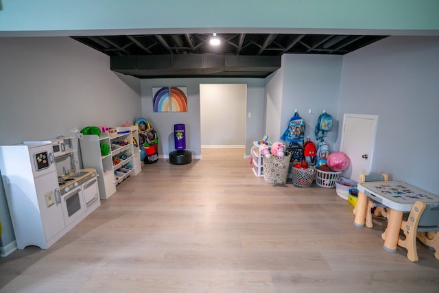 6175 Foxfire Cir, Clarkston, MI 48346 - rec room featuring light wood-style flooring and baseboards