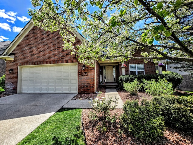 6175 Foxfire Cir, Clarkston, MI 48346 - view of front of property featuring brick siding, a garage, and driveway