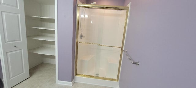bathroom with a stall shower